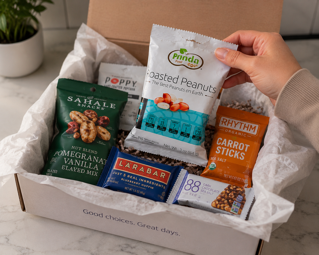 Pinda Lightly Salted Roasted Peanuts in a snack box with other healthy snacks